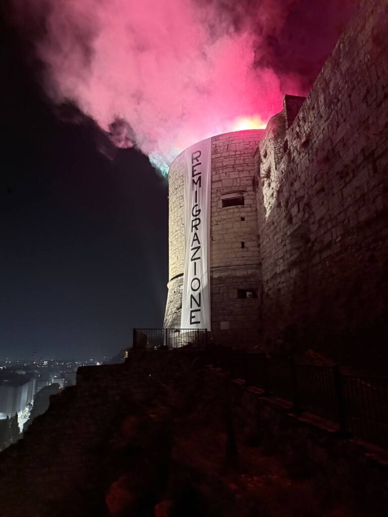 striscione remigrazione Brescia